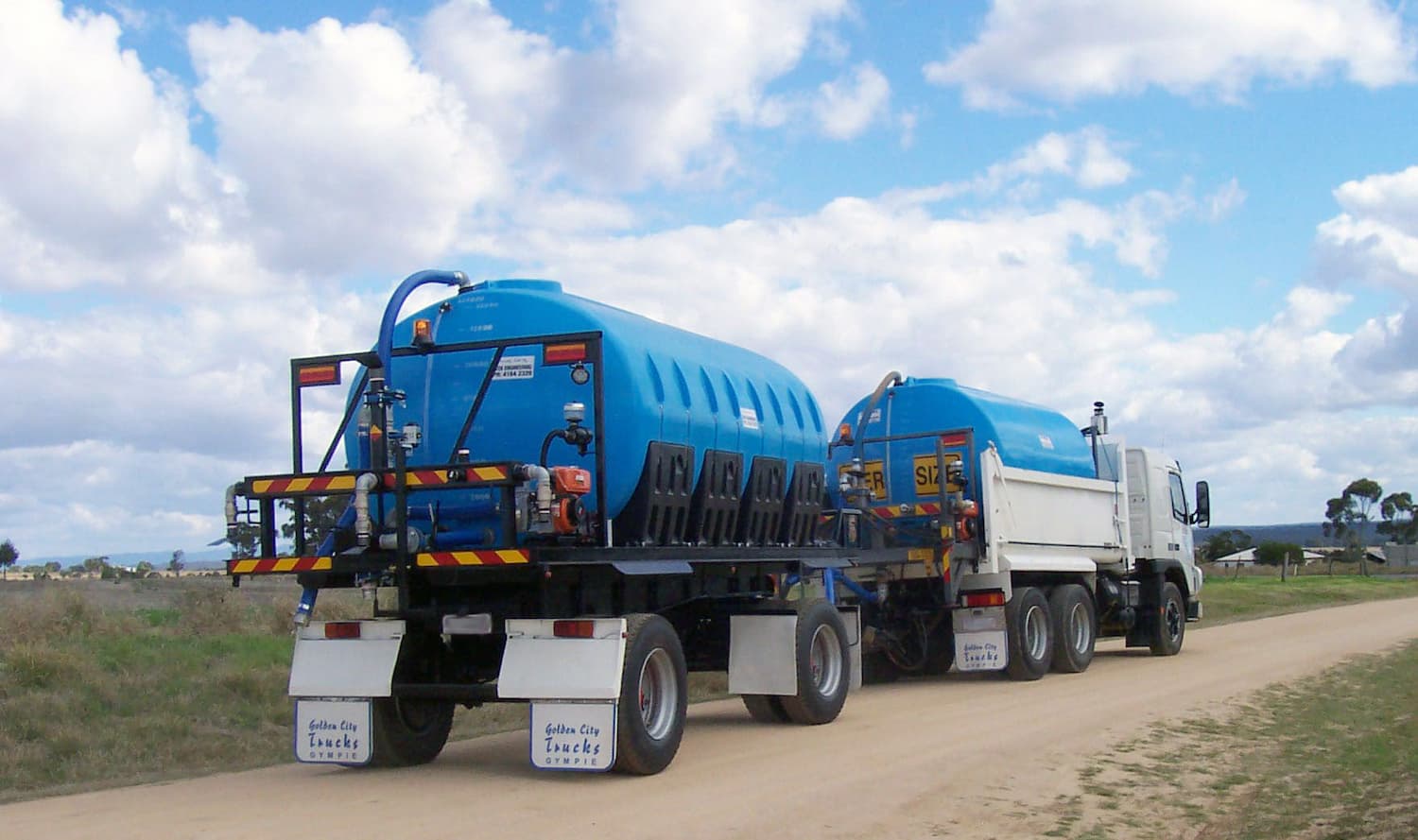 Cartage tanks mounted on a truck and trailer
